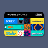 A Wobbleworks gift card featuring a colorful grid of icons including Scrib3D, Mindframes, 3Dooler, and AirBuilders on a dark slate blue background.
